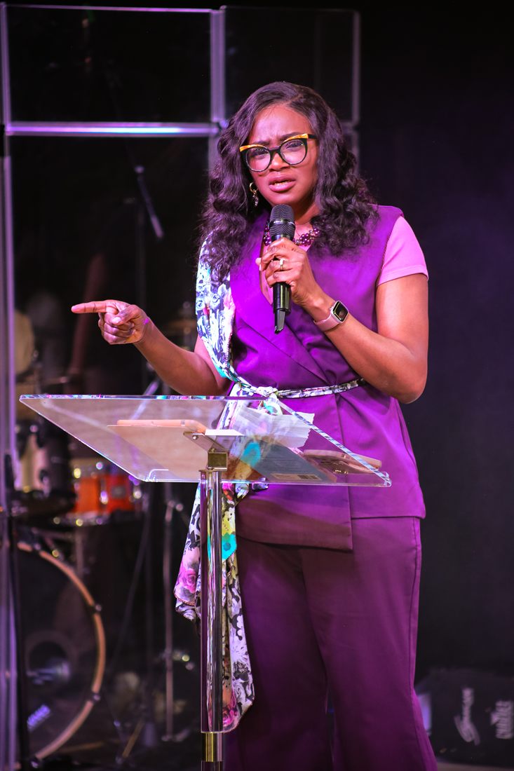 May Ijisesan speaking at a ministry gathering